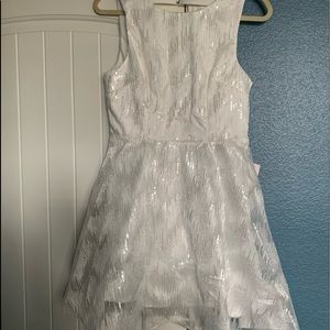 Lulu’s NWT white sequin skater dress with open back. Size Medium.